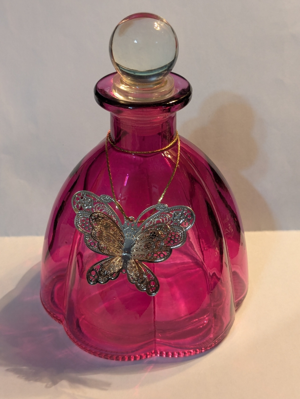 BNWT Pink Glass Bottle Decanter With Butterfly Ornament